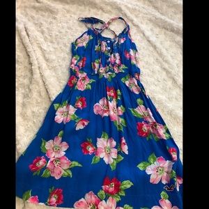 Floral summer dress with crisscross straps.