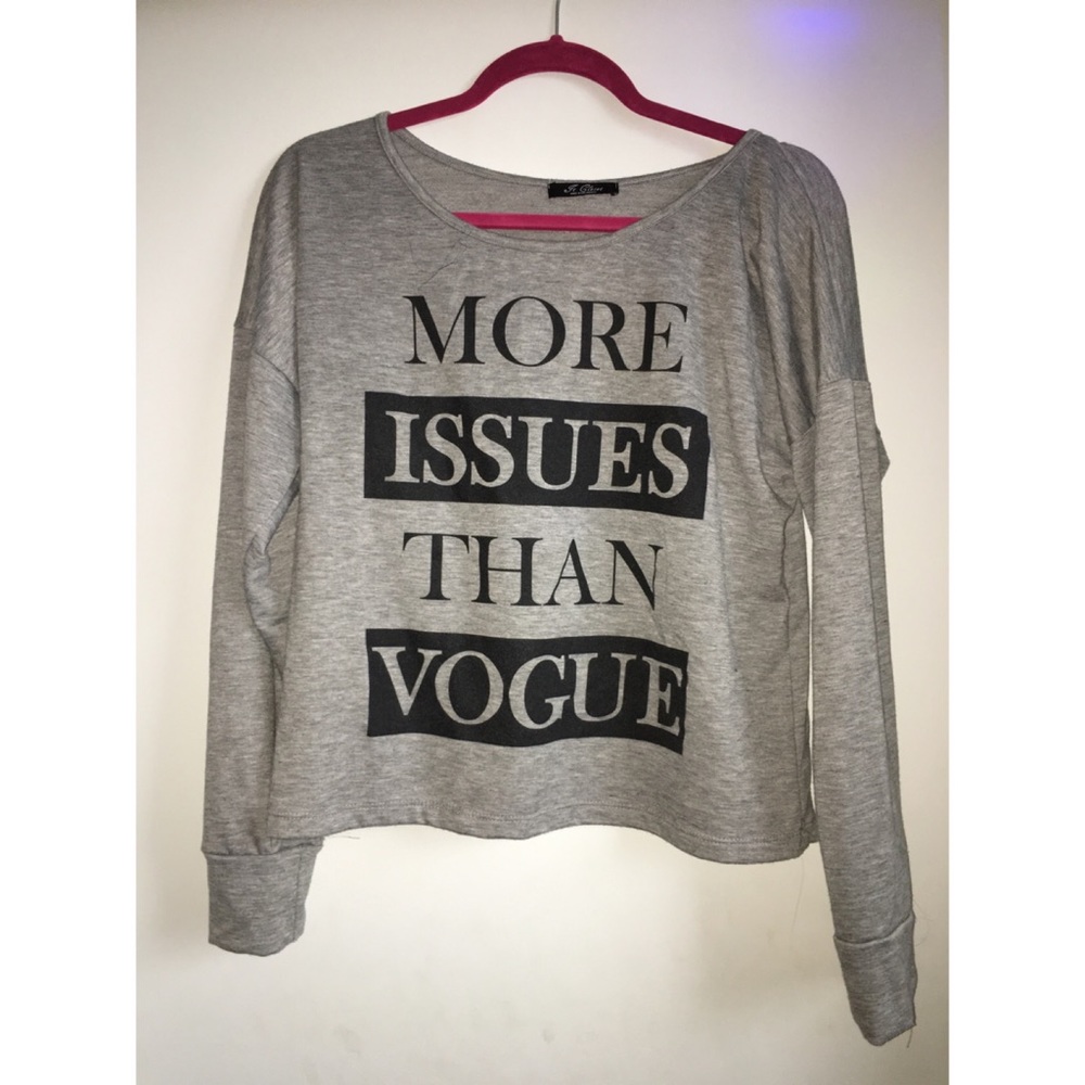 A grey and black blouse with cute witty writing!