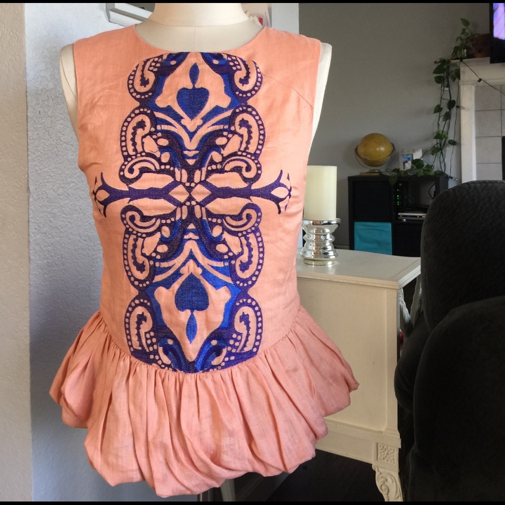 Three of Something Embroidered Peplum Top