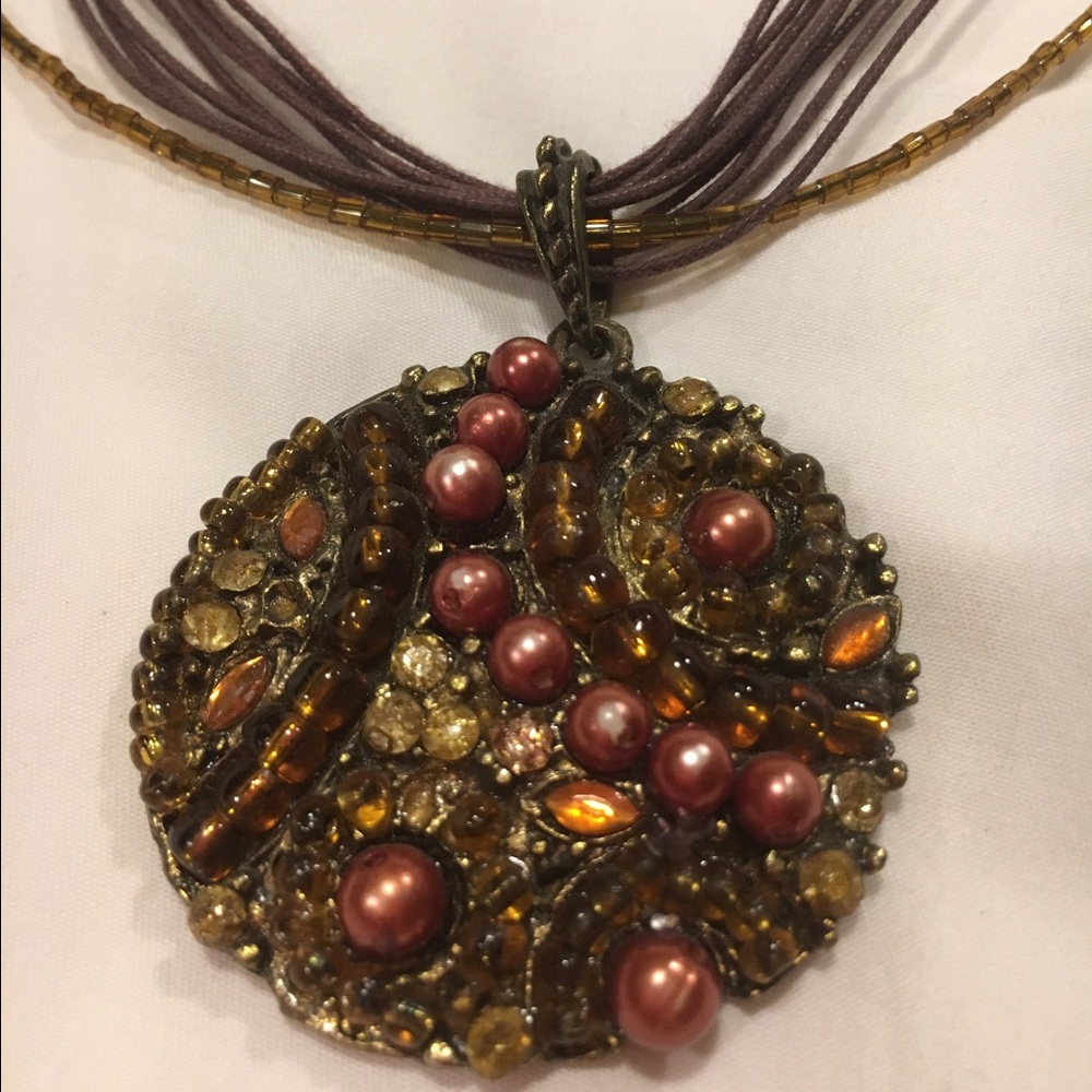 Gorgeous Beaded medallion necklace in warm tones