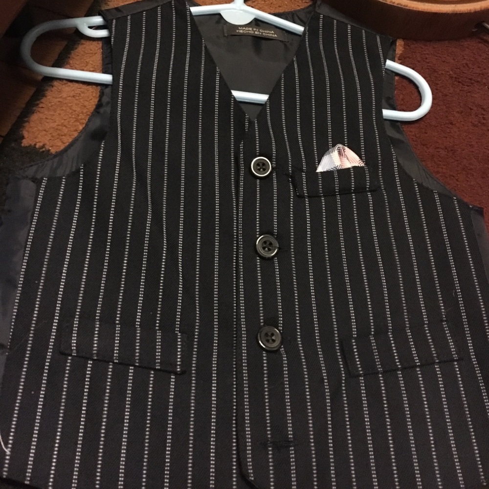 vest with pocket square and pants.