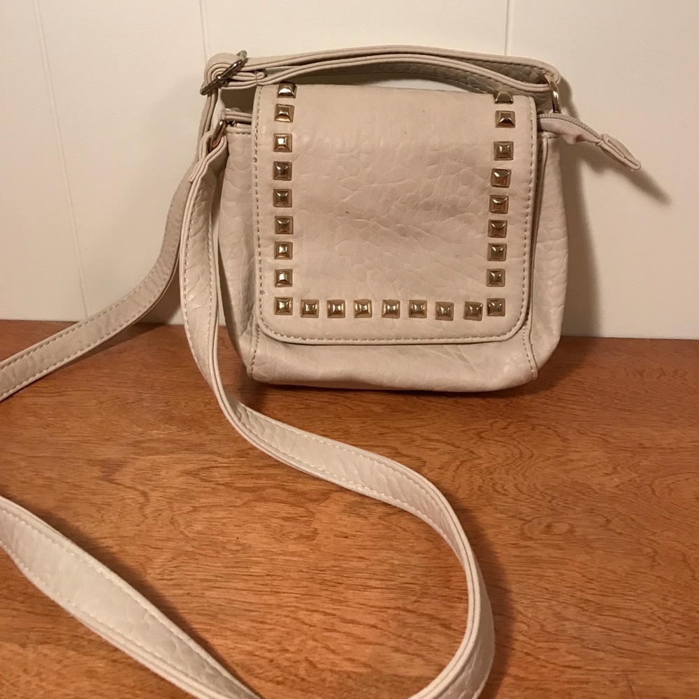 Cream color small cross body bag