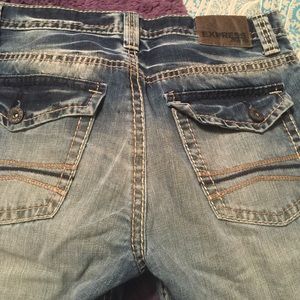 Men's distressed Express Jeans.