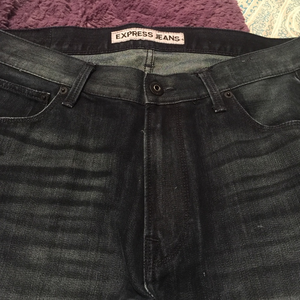 Dark blue Express men's jeans.