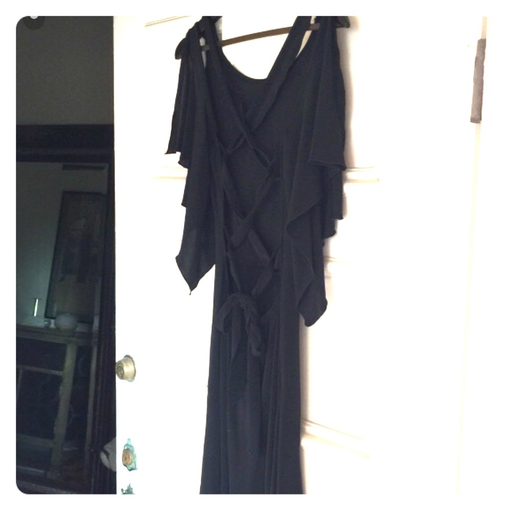 NWOT Mid black dress, strappy in the back.