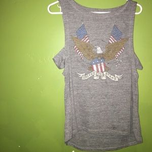 Grey "United We Stand" tank with side straps.