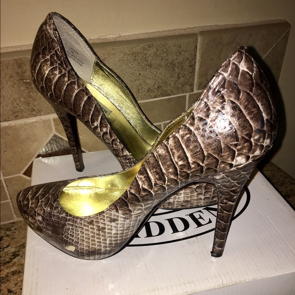 Steve Madden snake print pumps.