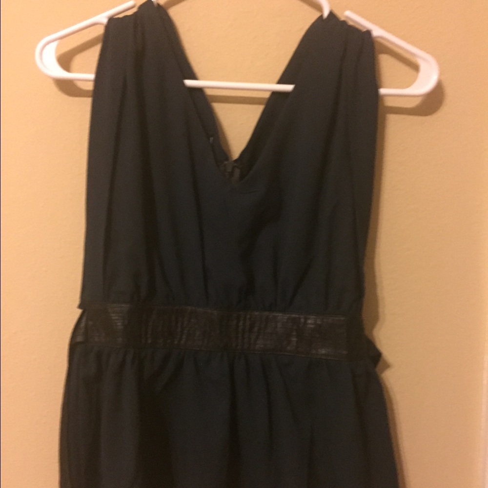 Sleeveless dark green top