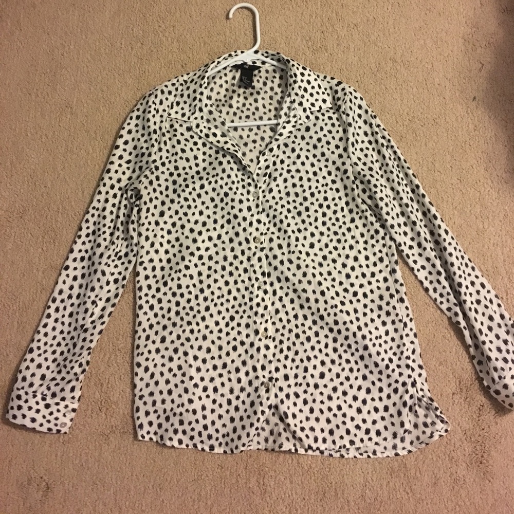 White blouse who're black spots