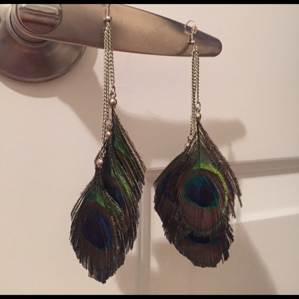 Stunning feather earrings with silver