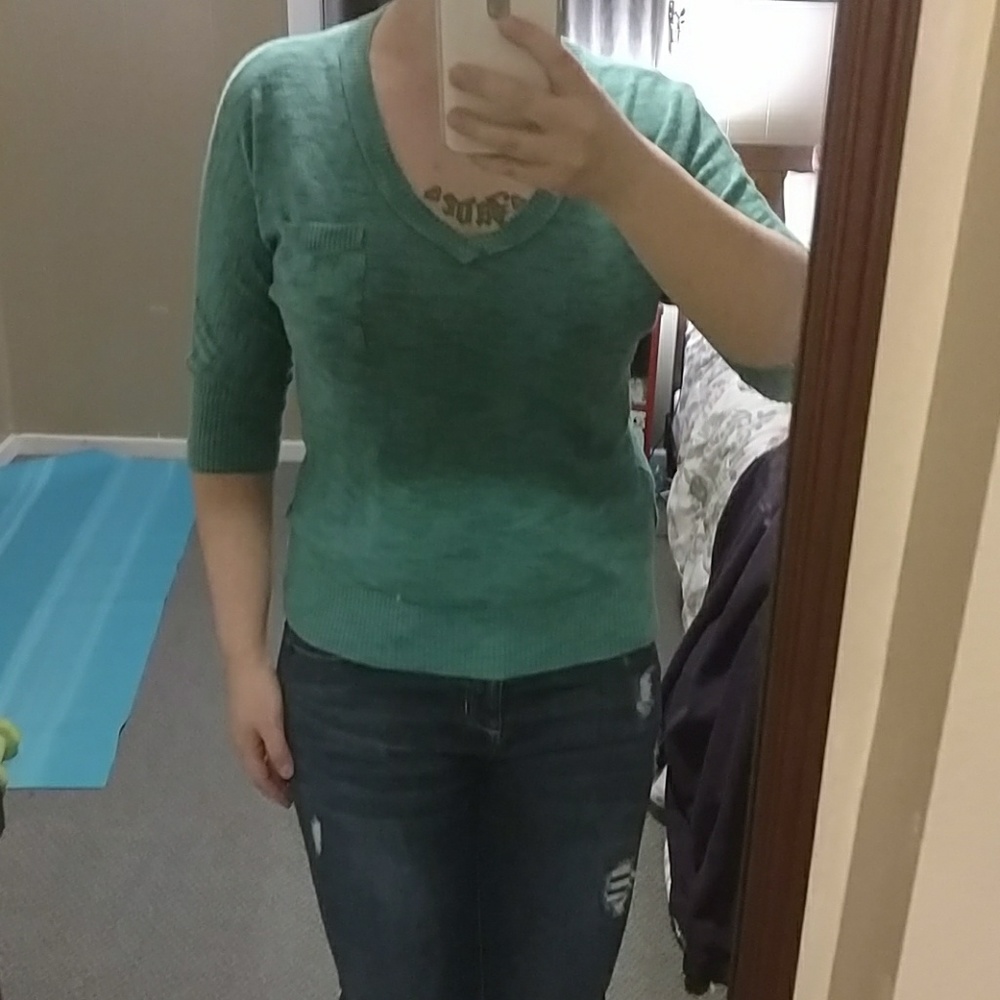 green sweater