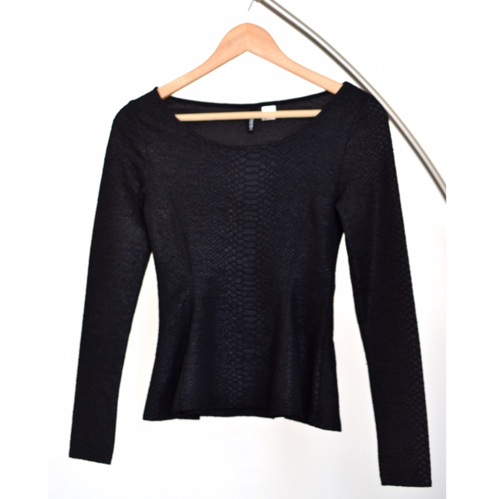 Peplum top with snakeskin texture