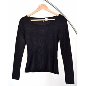 Peplum top with snakeskin texture