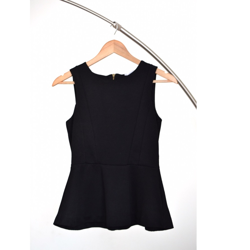 Black sleeveless Peplum top