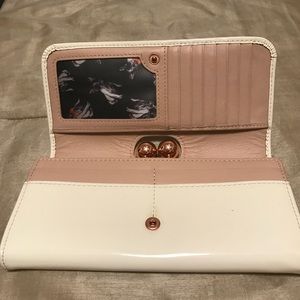 Authentic Ted Baker wallet. Used, good condition.