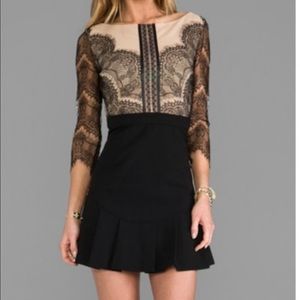 Three floor, lace cocktail dress. never worn.