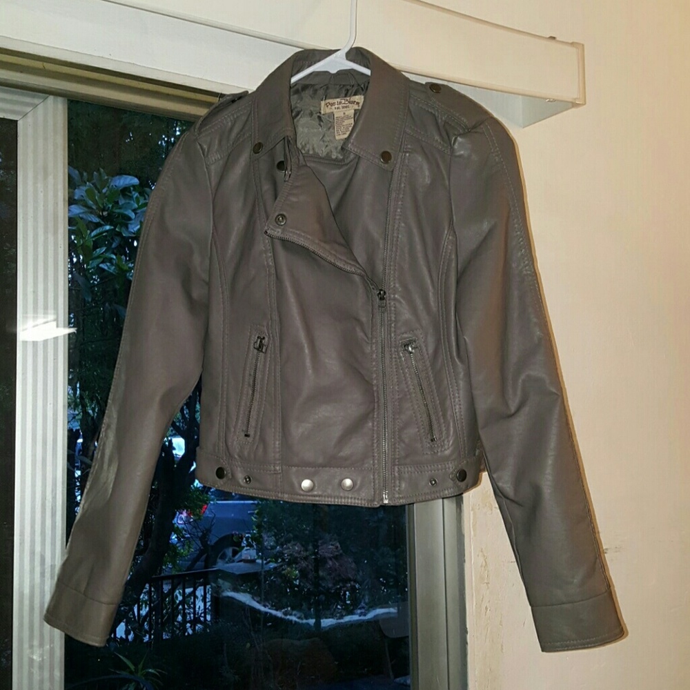 Gray leather jacket .