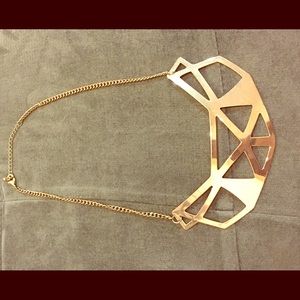 Modern gold cut outs necklace