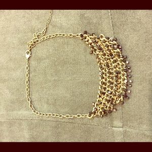 Gold necklace with black crystals