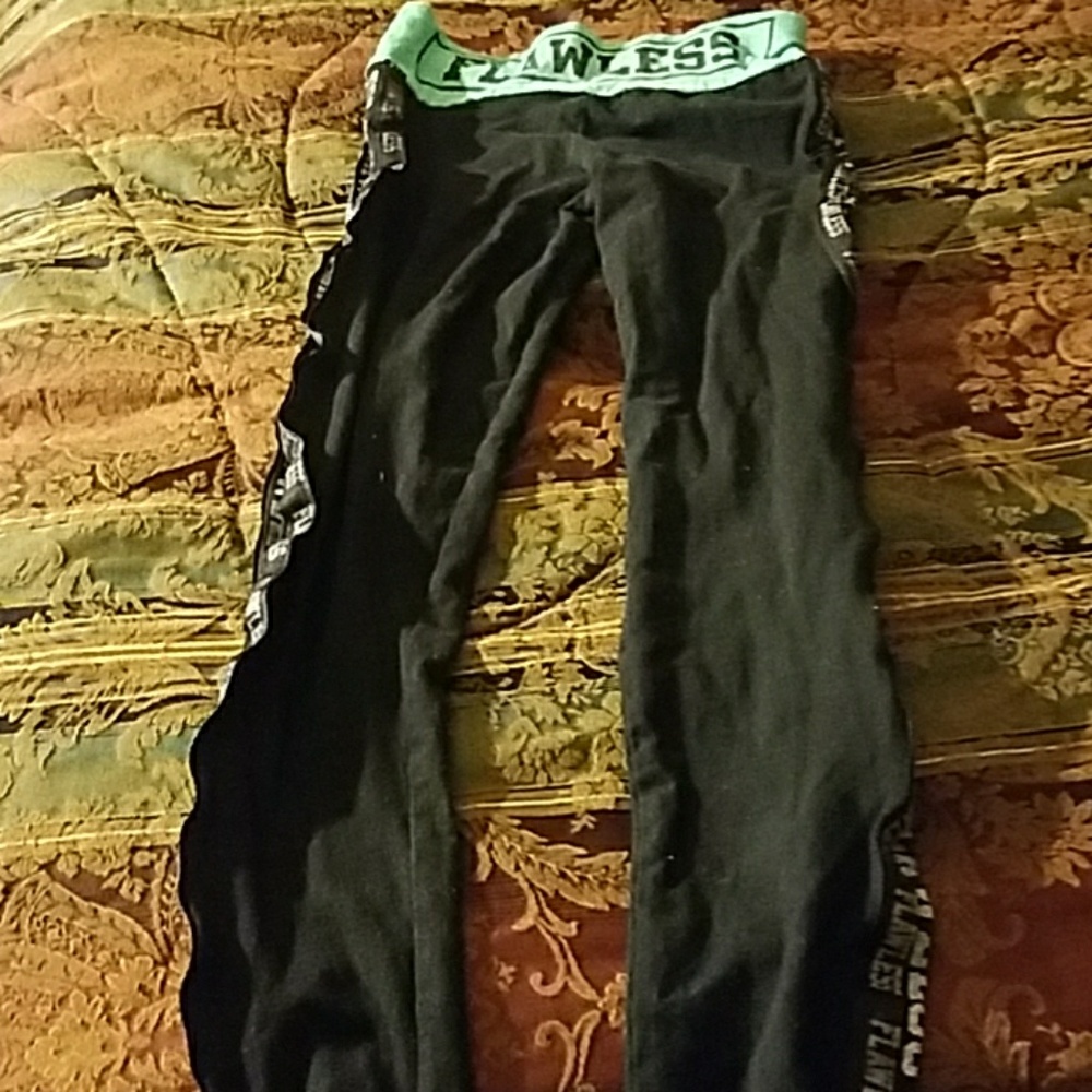 Leggings say flawless in Turquoise around waist