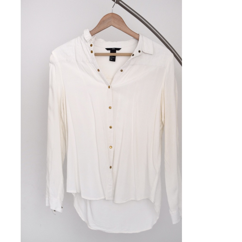 White blouse embellished shoulders