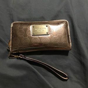 Micheal Kors Limited Edition Rose Gold Tech Wallet