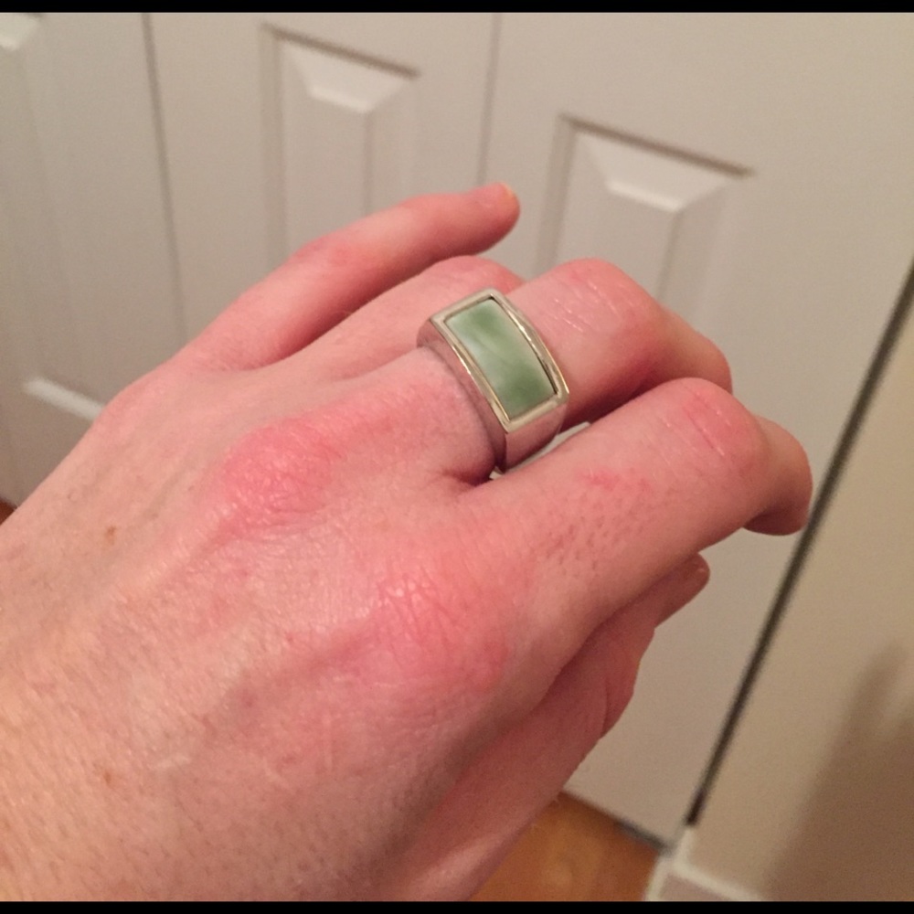 Silver ring with light blue stone