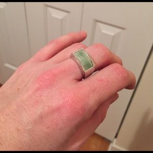 Silver ring with light blue stone