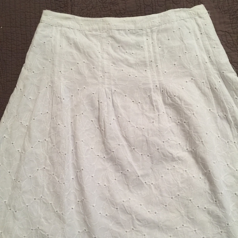 Feminine white eyelet skirt.