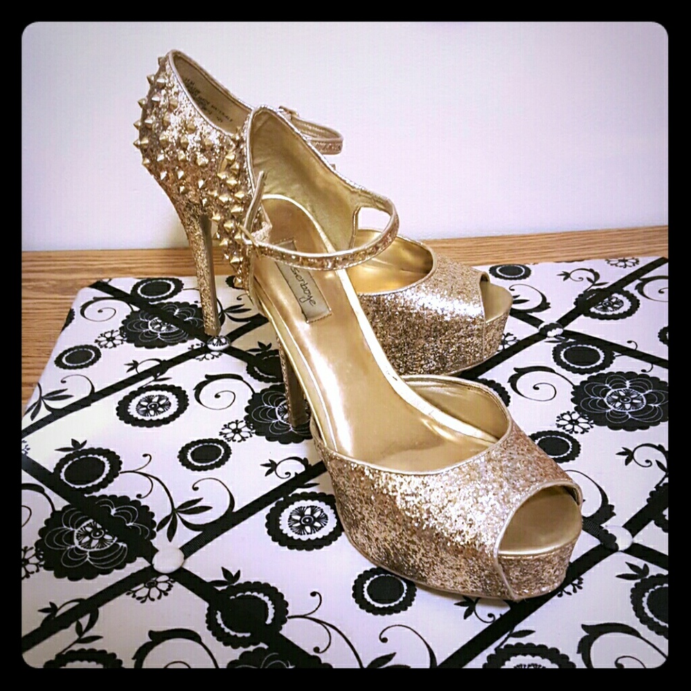 Gold high heels