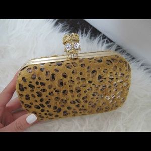 Leopard Gold Clutch Skull
