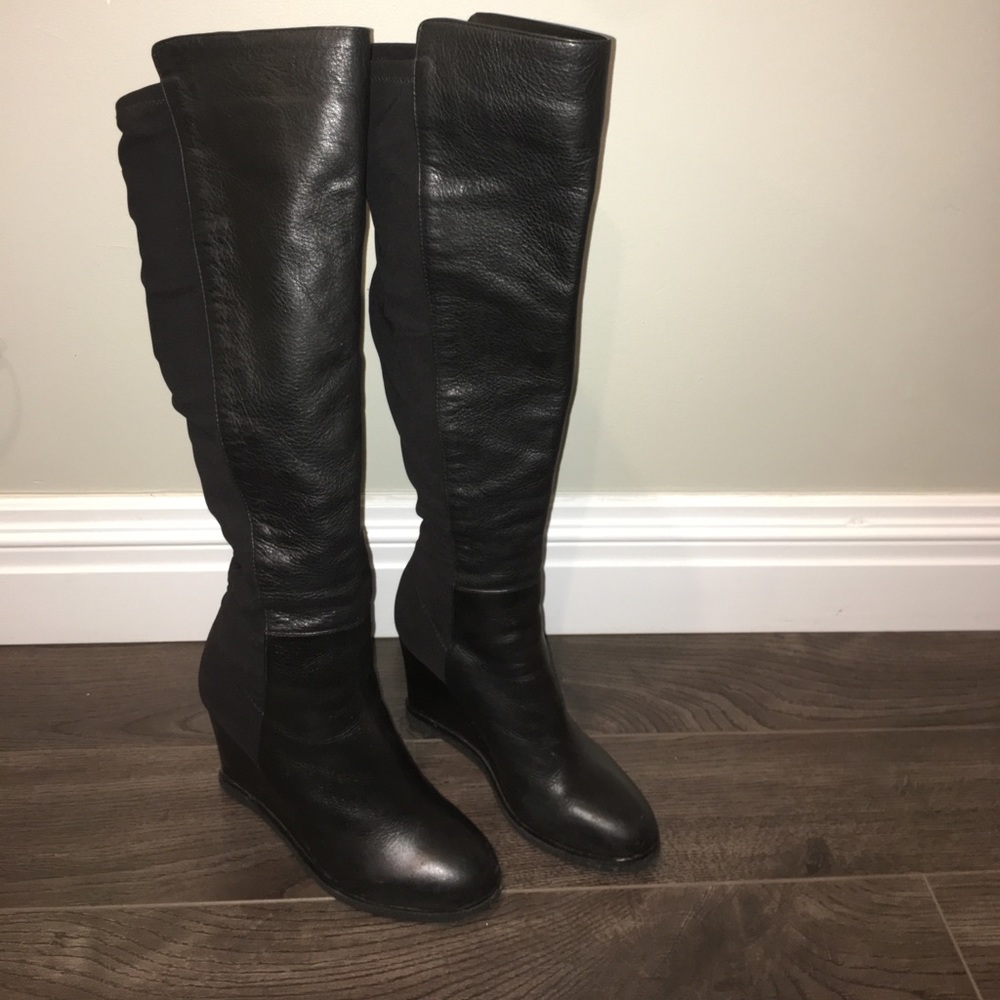 High Wedged black leather boots
