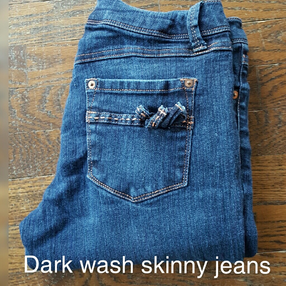 Dark wash skinny jeans.