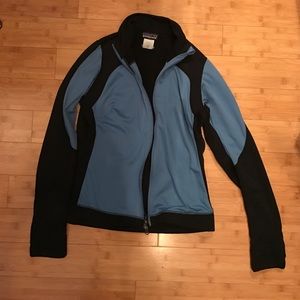 Patagonia zip up jacket with large pocket on back
