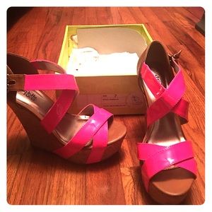 Neon pink strapped wedges