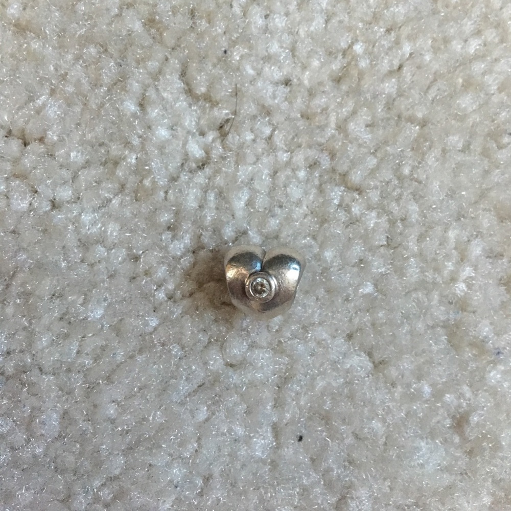 Pandora silver heart with stone in the middle