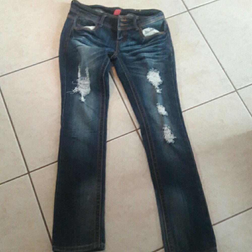 Almost famous tourn look blue jeans.