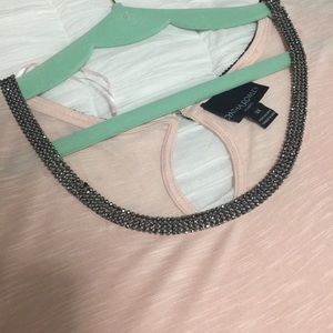 Blush top with embellished neckline