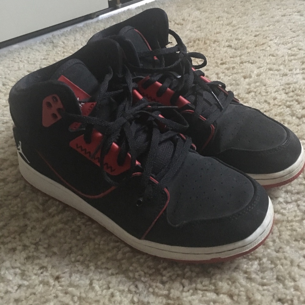 red black and white nike jordans