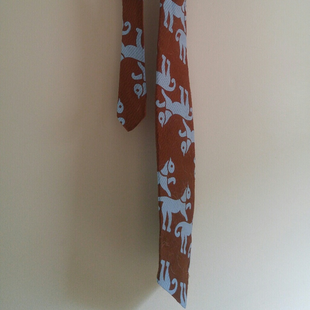 Brown tie with baby blue female lion print
