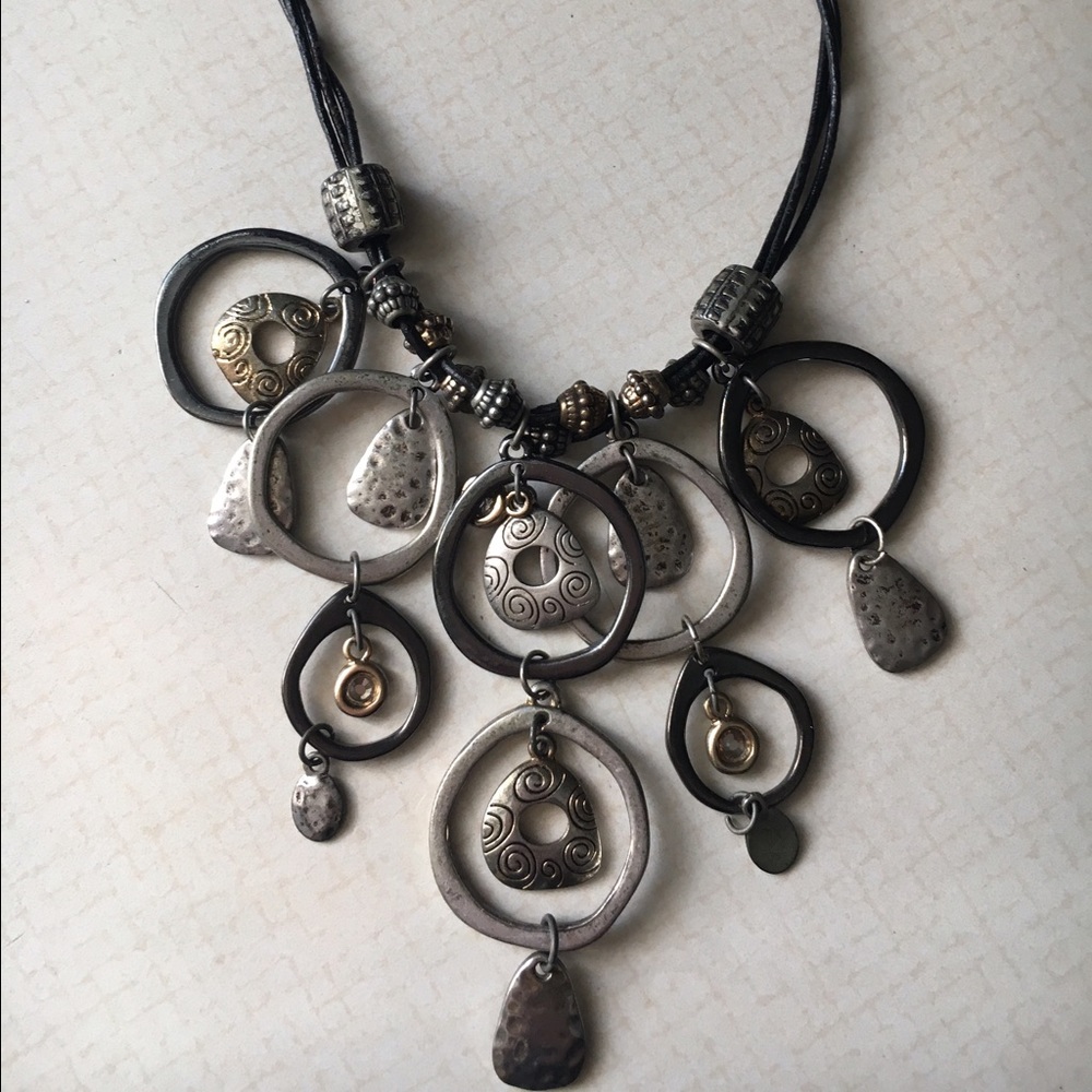 Temperatures dropping .. so the price ..Multi black silver bronze necklace