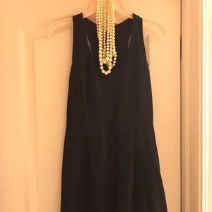 Black J. Crew black racerback dress. Size 4.