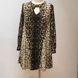 Sale!  $15. Leopard print dress w/ pockets.