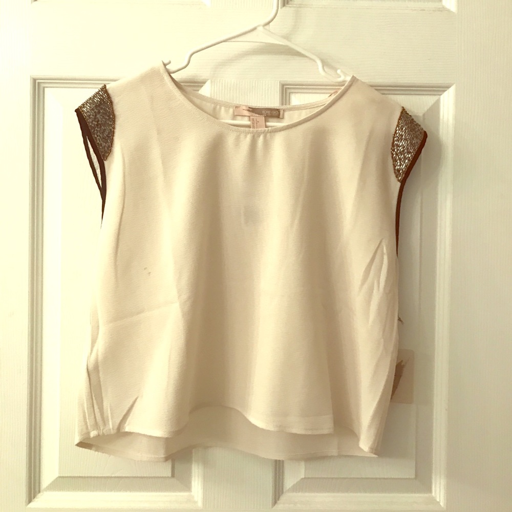 Tan and sequined crop top