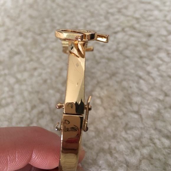 kate spade Jewelry - Listing is for 2 of 4 bangles. "Smile and key" kate spade Jewelry - Listing is for 2 of 4 bangles. "Smile and key"
