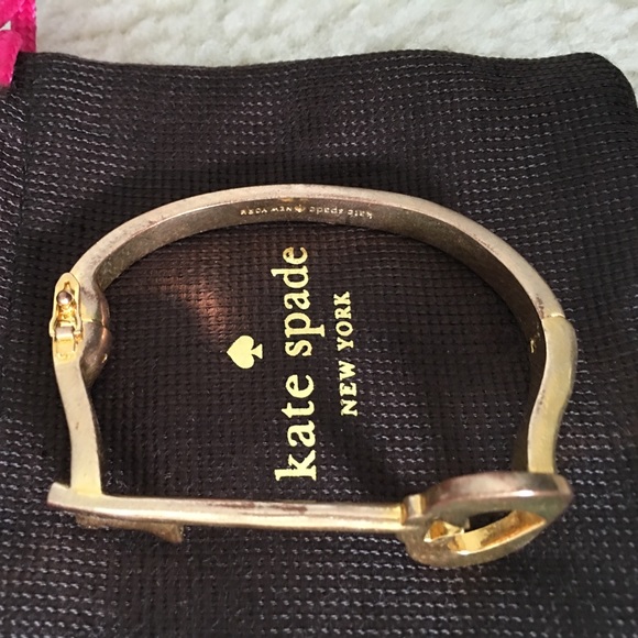 kate spade Jewelry - Listing is for 2 of 4 bangles. "Smile and key" kate spade Jewelry - Listing is for 2 of 4 bangles. "Smile and key"