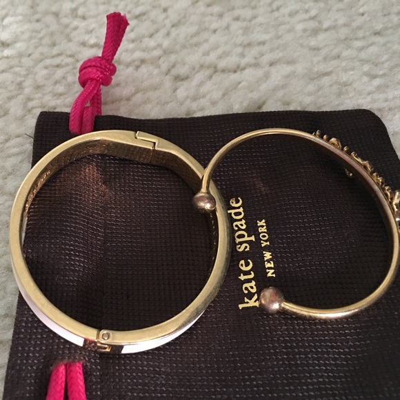 kate spade Jewelry - Listing is for 2 of 4 bangles. "Smile and key" kate spade Jewelry - Listing is for 2 of 4 bangles. "Smile and key"