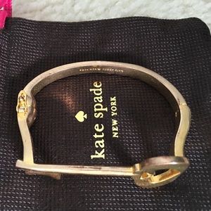 kate spade Jewelry - Listing is for 2 of 4 bangles. "Smile and key" kate spade Jewelry - Listing is for 2 of 4 bangles. "Smile and key"