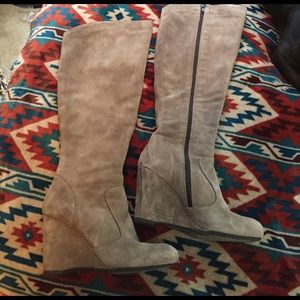 Knee high wedge boots