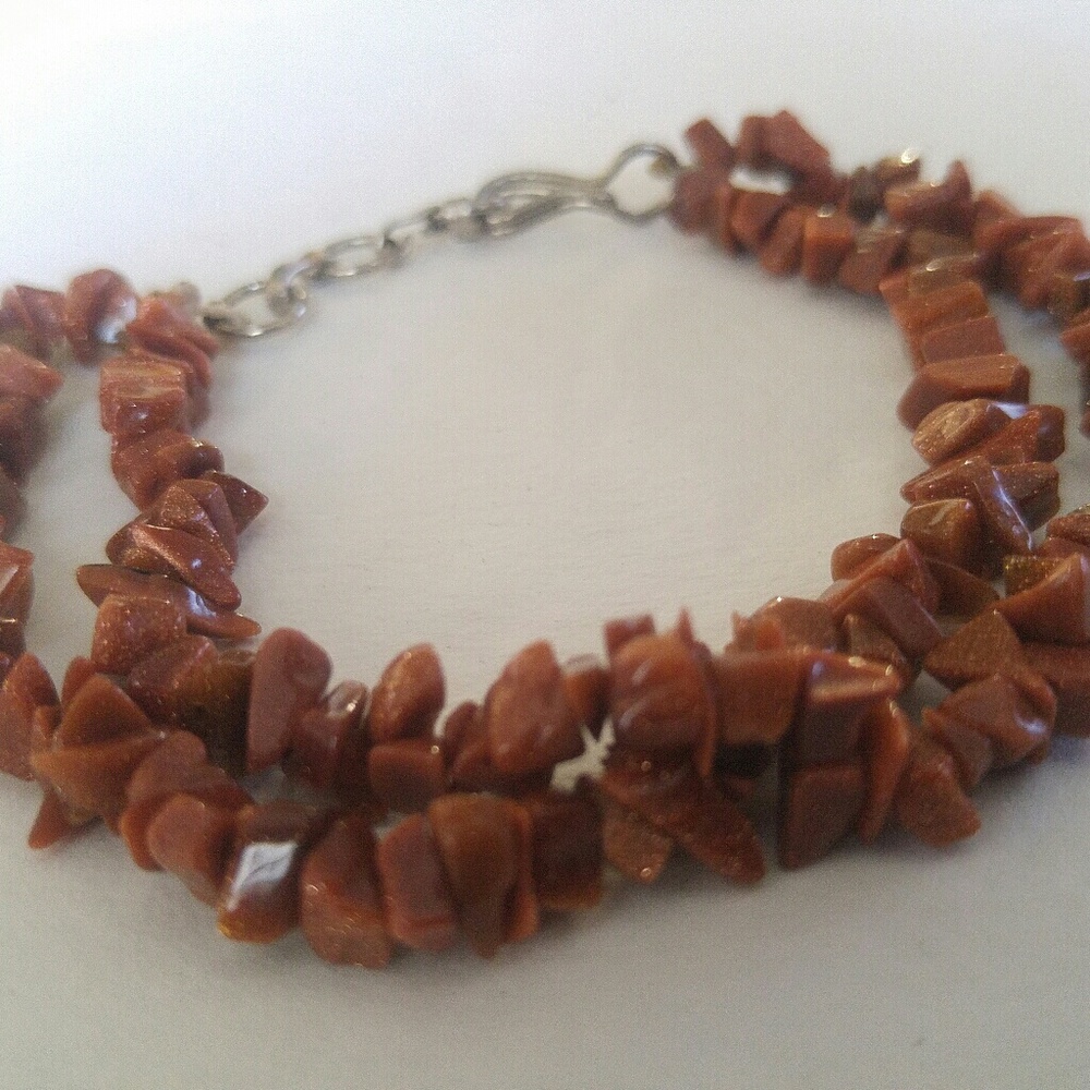 Bracelet with two strands and a silver clasp